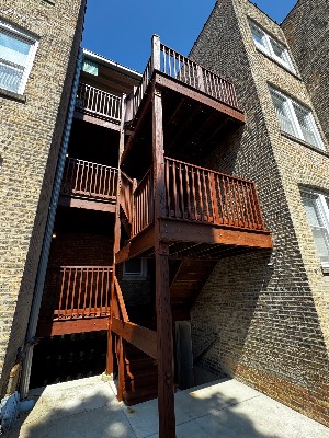 Three-storey rear porch, stained top to bottom