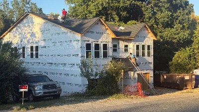 Roofing work on a new construction home