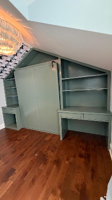 Painted built-in shelving and desk with hardwood floors