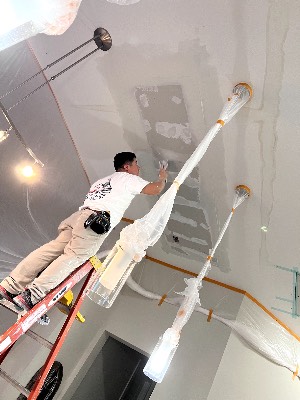 Ceiling drywall repair in progress