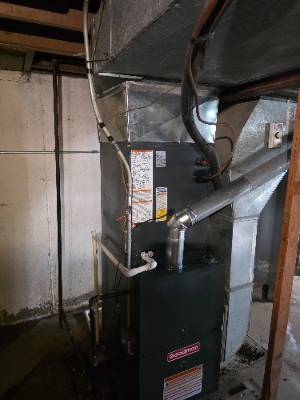 Goodman furnace and ductwork installed in a basement