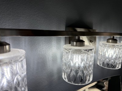Freshly cleaned bathroom vanity light fixture