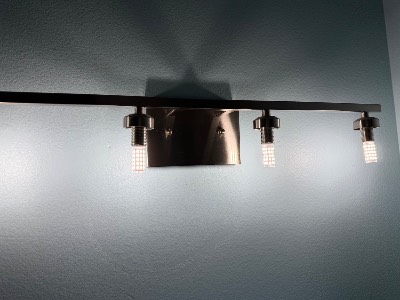 Freshly cleaned bathroom vanity light fixture