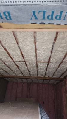 Spray foam insulation detail on framing and roof deck