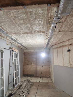 Spray foam insulation applied on a residential job site