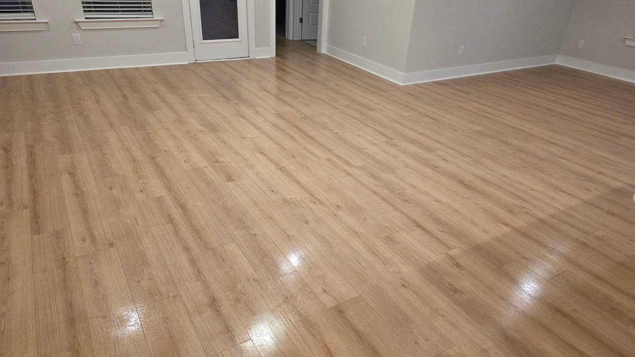 Freshly cleaned living room with polished hardwood floors by Sandra House Cleaning Service in Huntsville, AL
