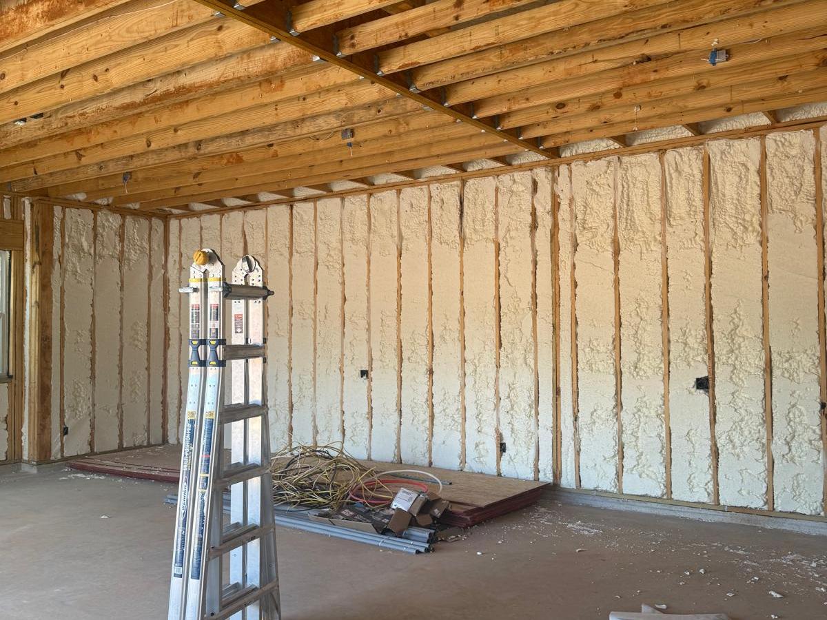 Spray foam insulation installed in the wall cavities of a new home by Allstar Insulation