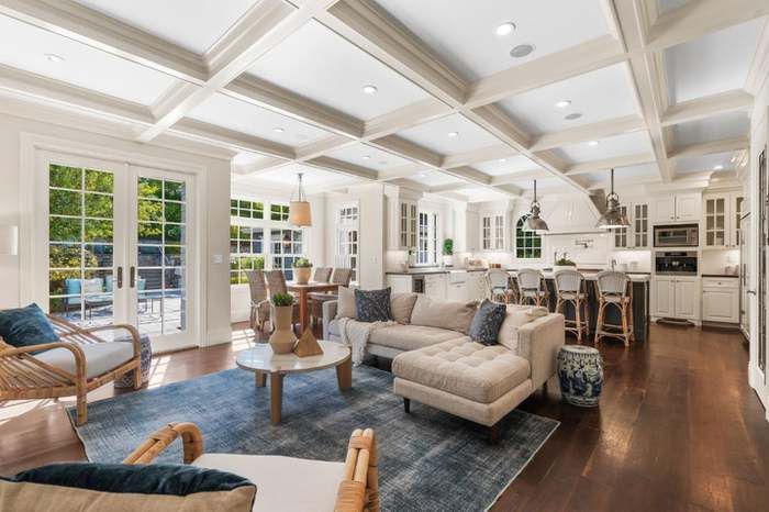 Coffered-ceiling great room, cleaned for showing