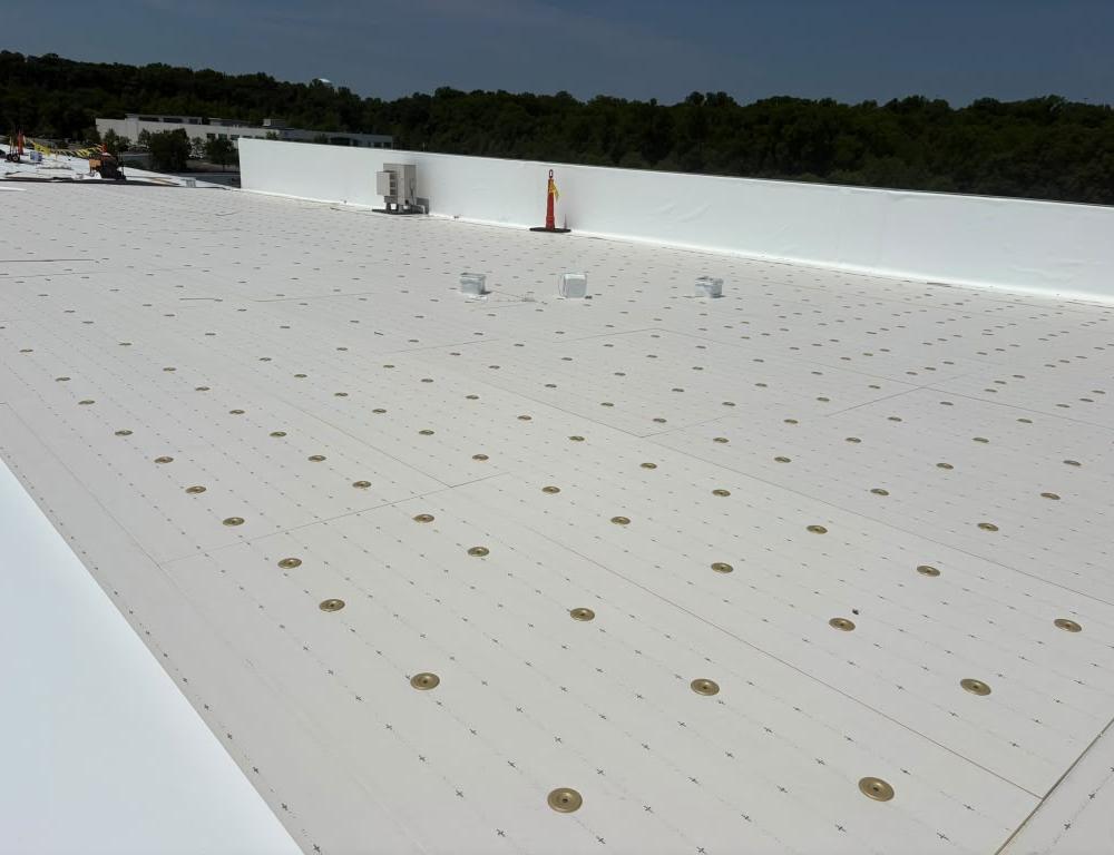 TPO, EPDM, or PVC: Choosing a Flat Roof System in New England