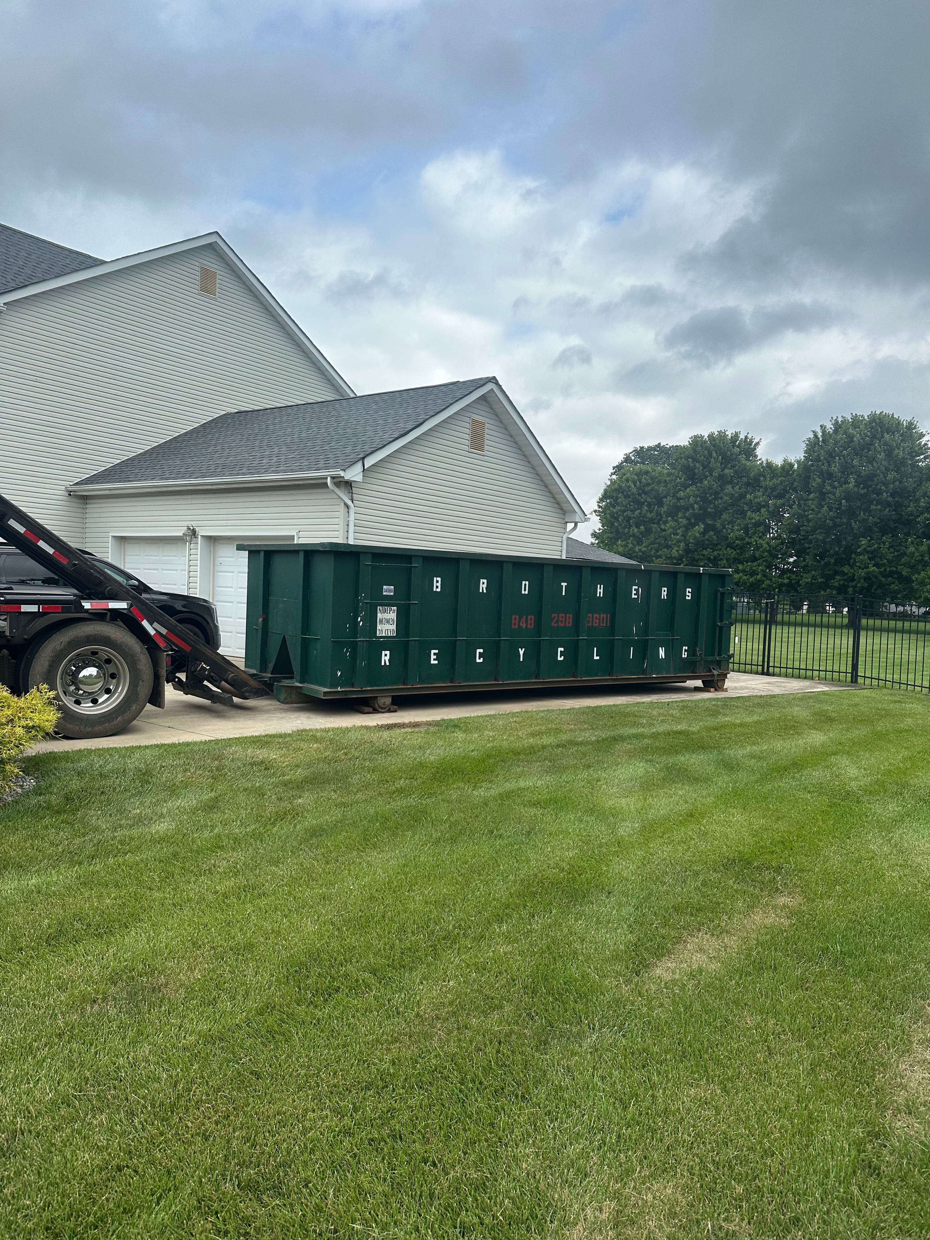 Roll-off container and cleanout work by Brothers Recycling LLC