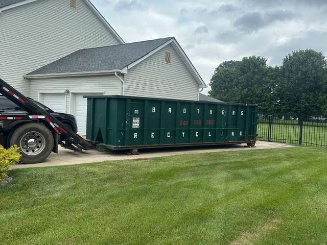 Roll-off container and cleanout work by Brothers Recycling LLC