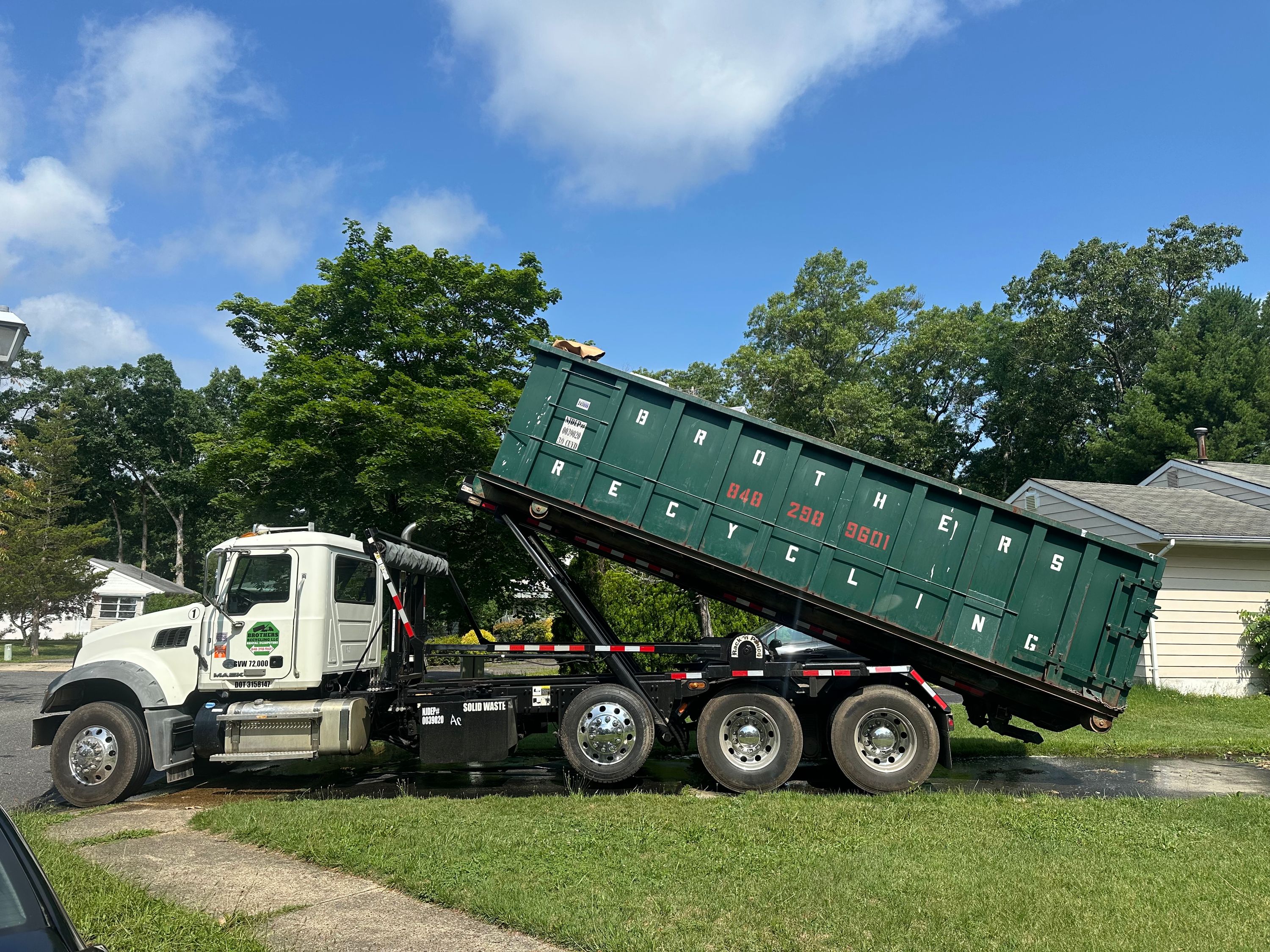 Roll-off container and cleanout work by Brothers Recycling LLC