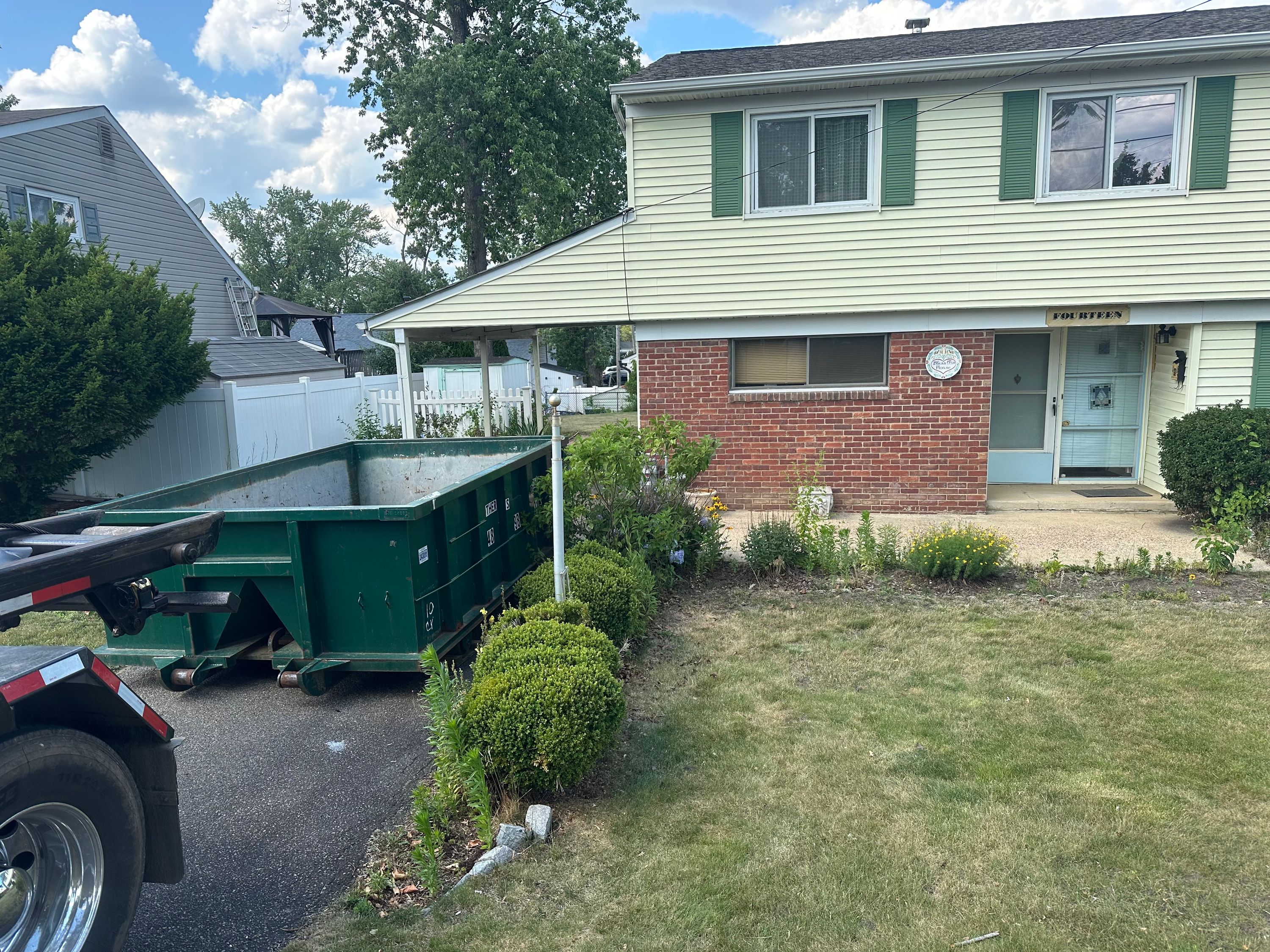 Roll-off container and cleanout work by Brothers Recycling LLC