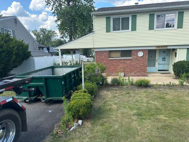 Roll-off container and cleanout work by Brothers Recycling LLC