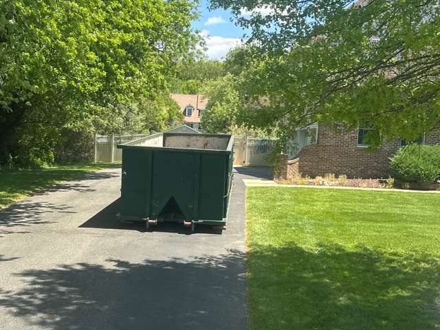 Roll-off container and cleanout work by Brothers Recycling LLC
