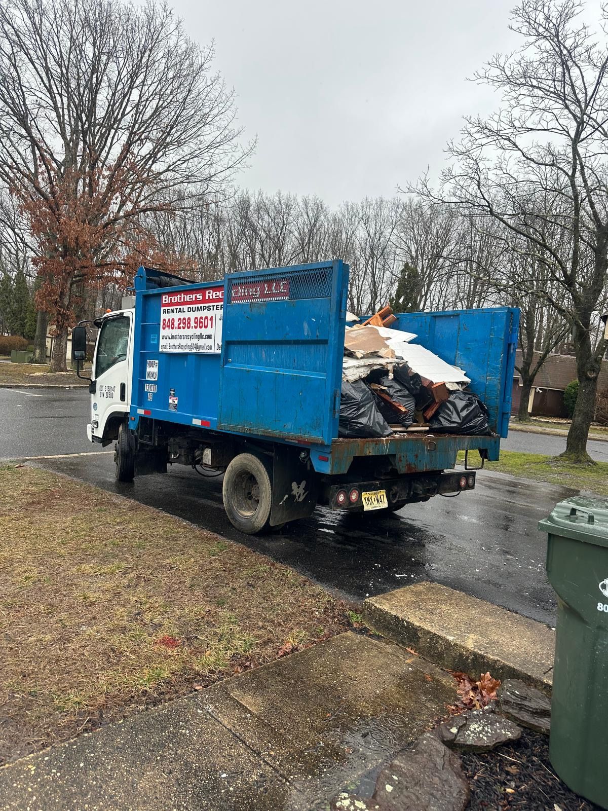 Roll-off container and cleanout work by Brothers Recycling LLC