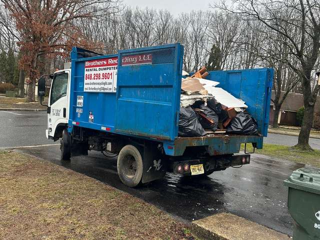 Roll-off container and cleanout work by Brothers Recycling LLC