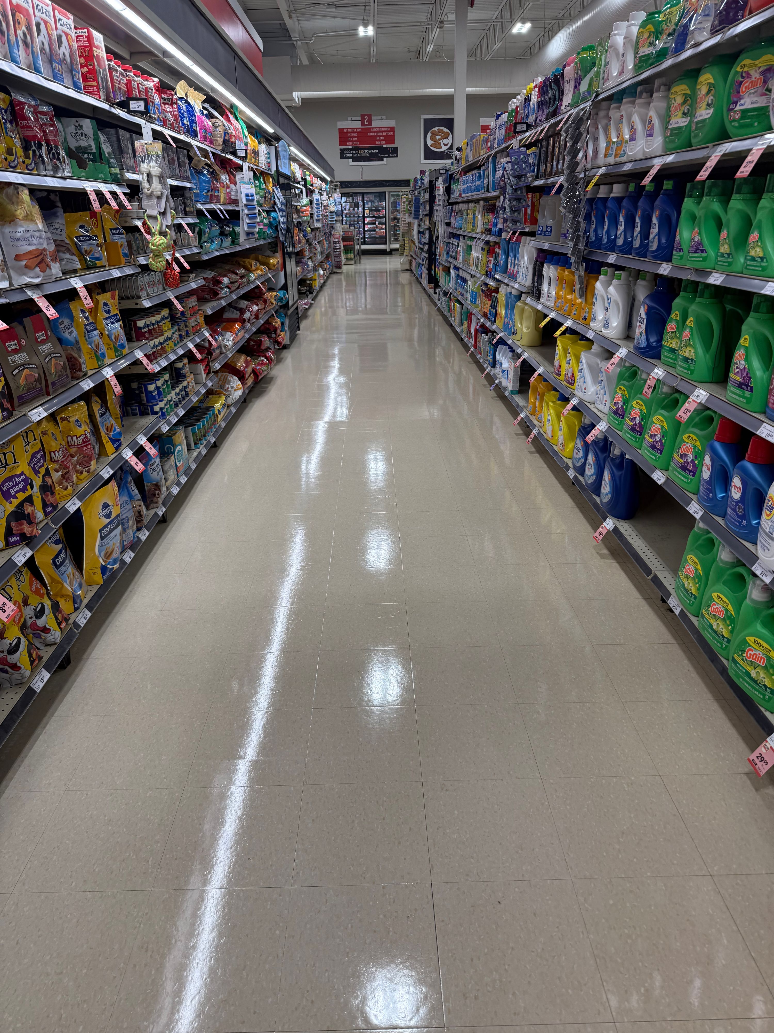C.A.M Maintenance Ltd crew stripping a commercial floor