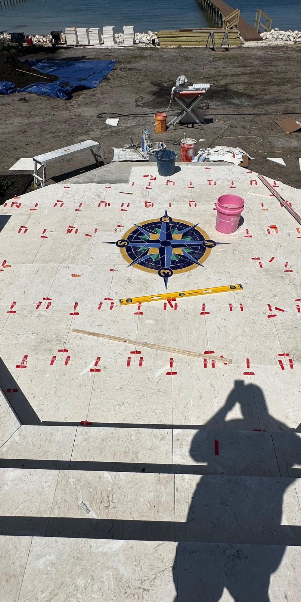 Custom Stone Medallions: How a Compass Rose Gets Set Into a Deck