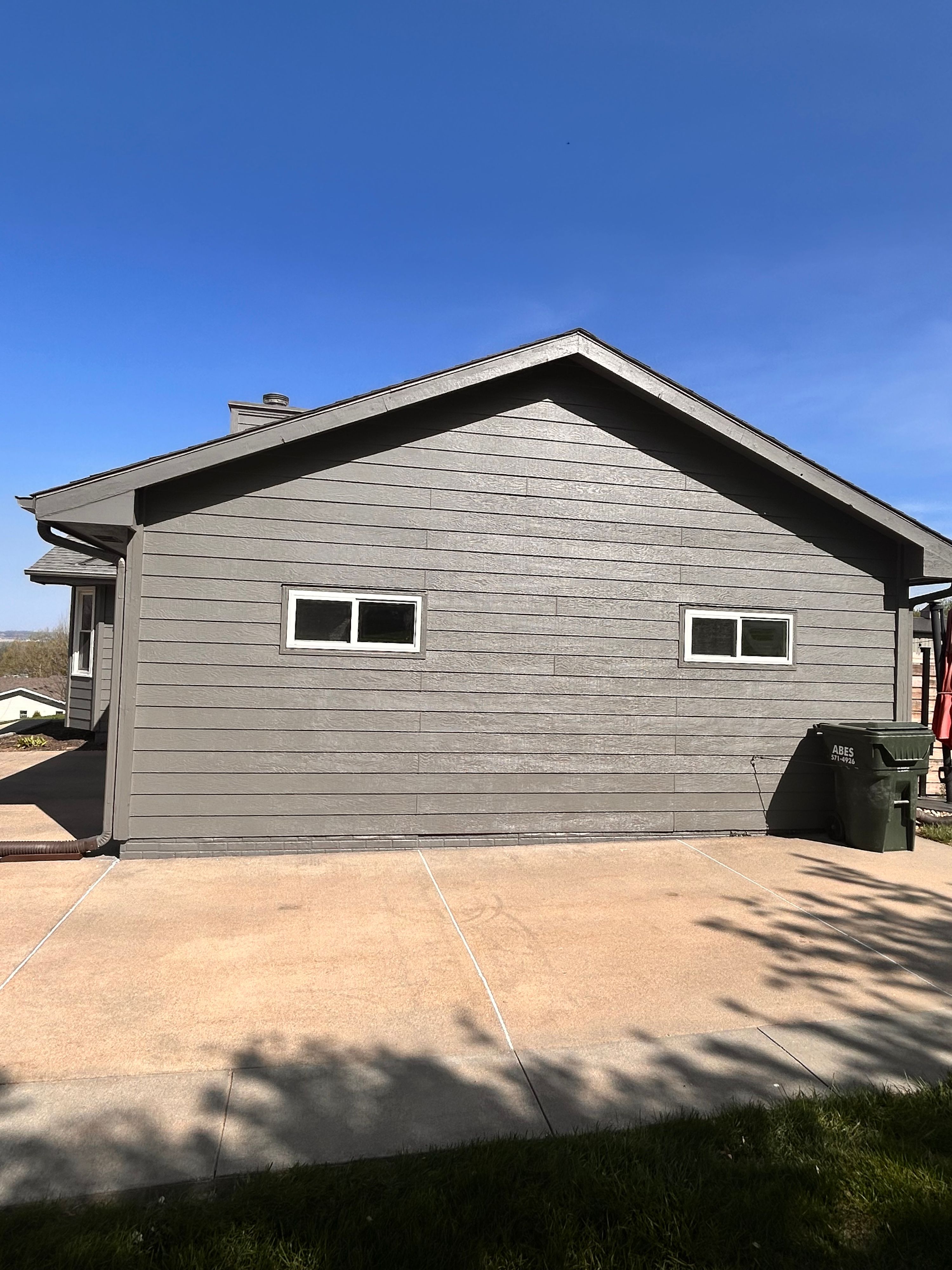 D&M Construction & Exteriors project photo 18 — siding, window, roofing and painting work around Omaha