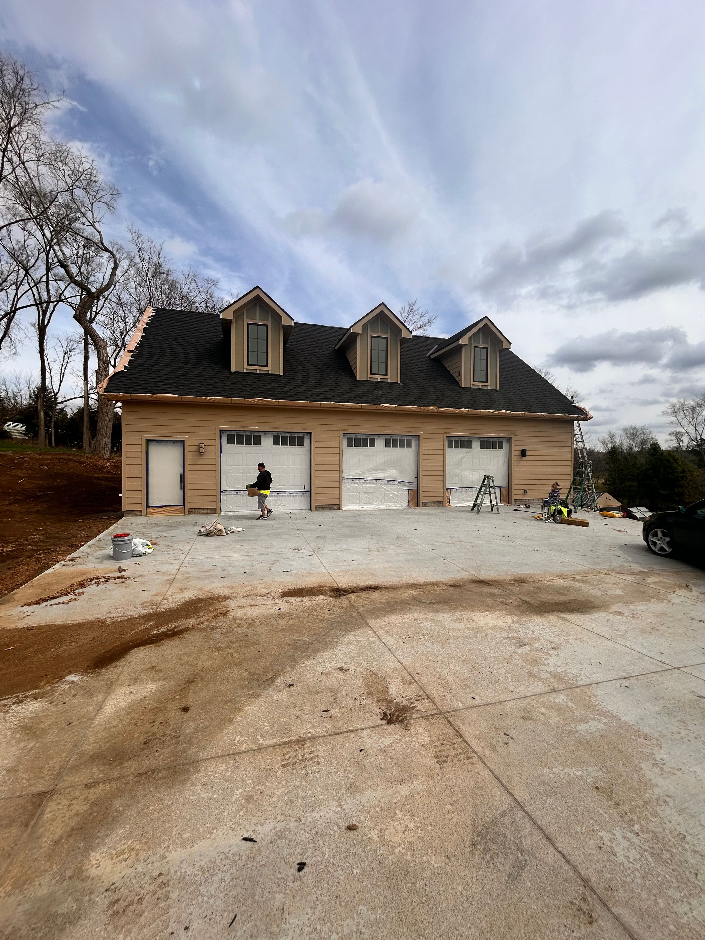 D&M Construction & Exteriors project photo 3 — siding, window, roofing and painting work around Omaha
