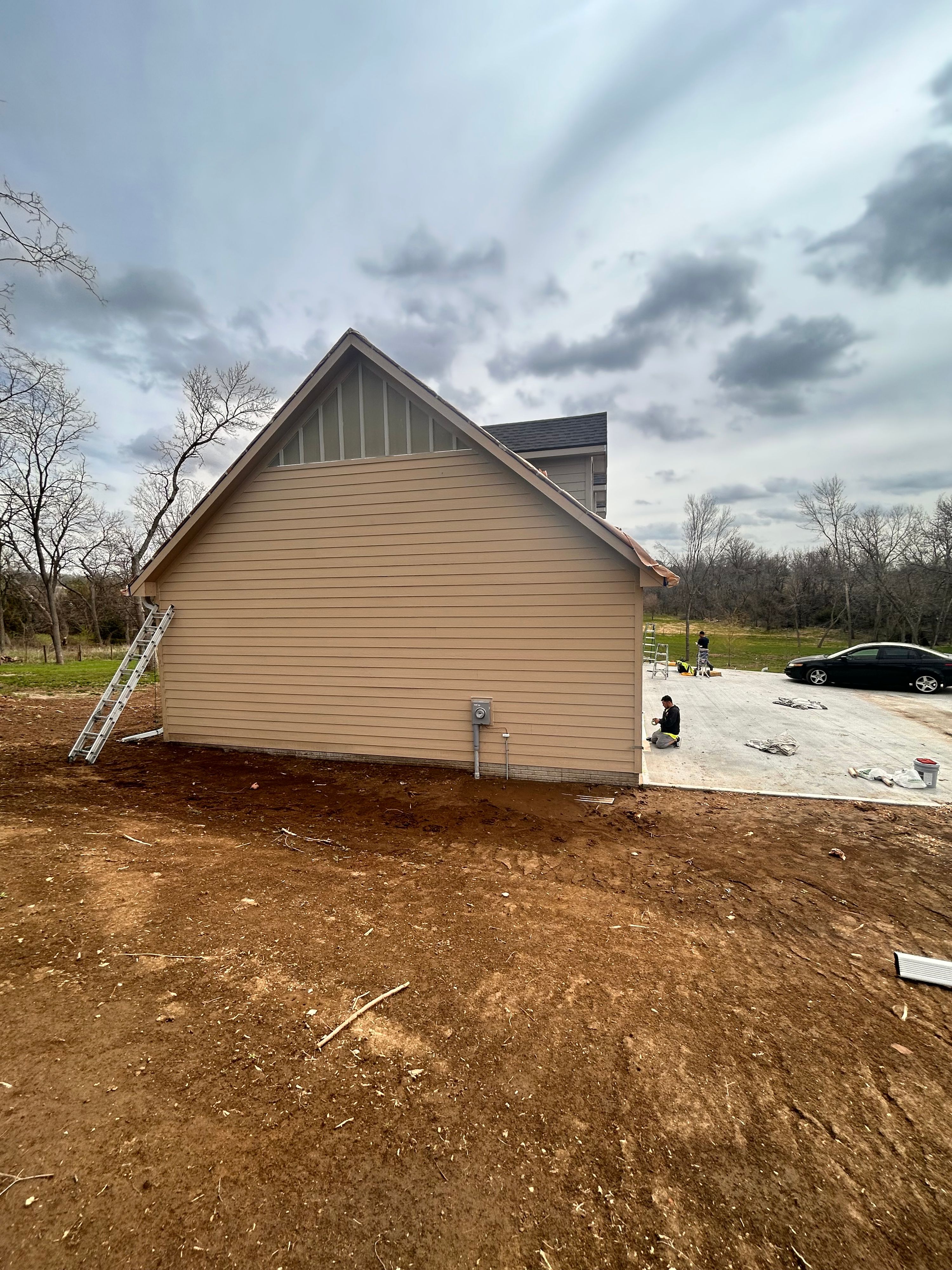D&M Construction & Exteriors project photo 2 — siding, window, roofing and painting work around Omaha