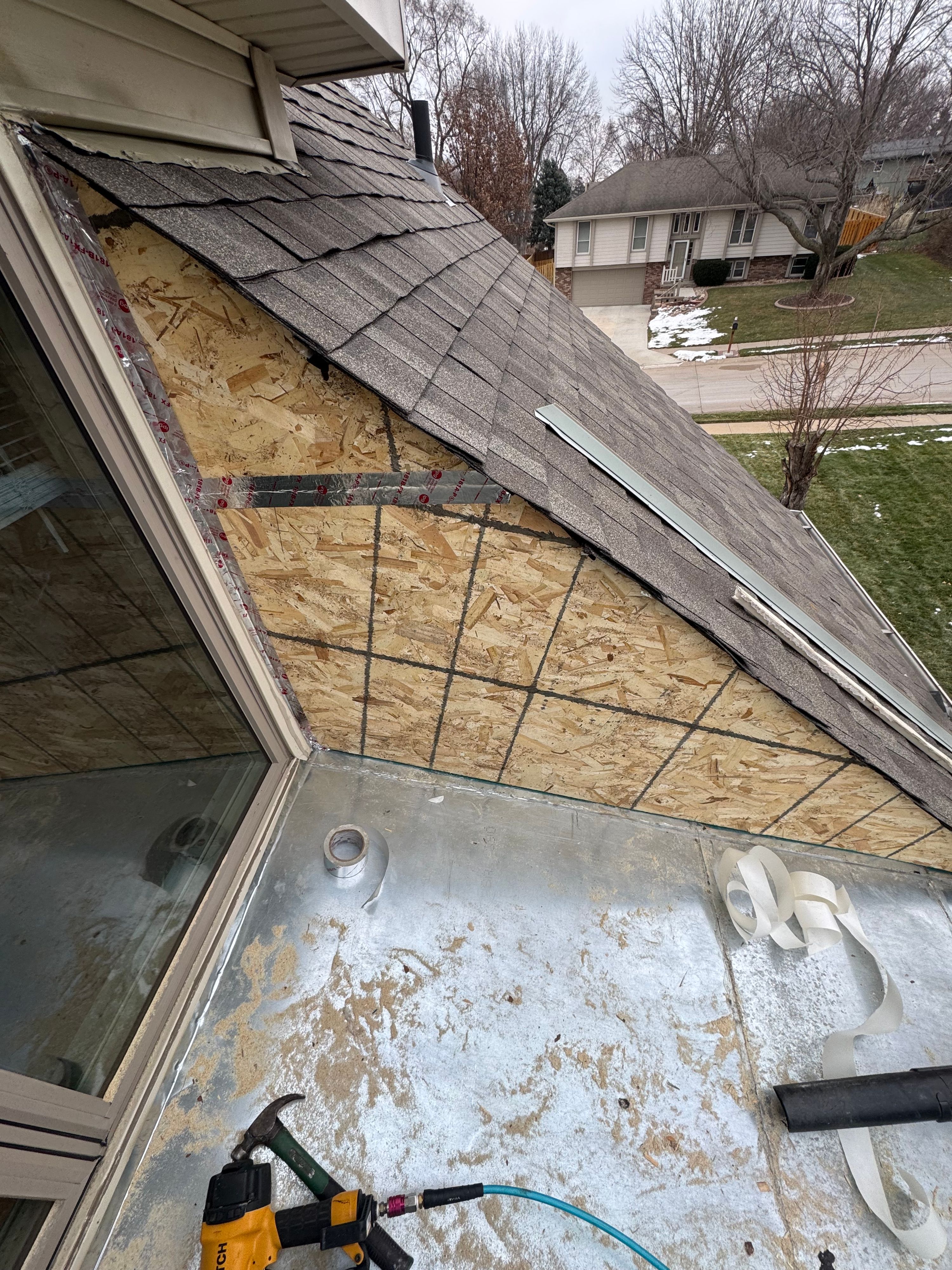 D&M Construction & Exteriors project photo 1 — siding, window, roofing and painting work around Omaha