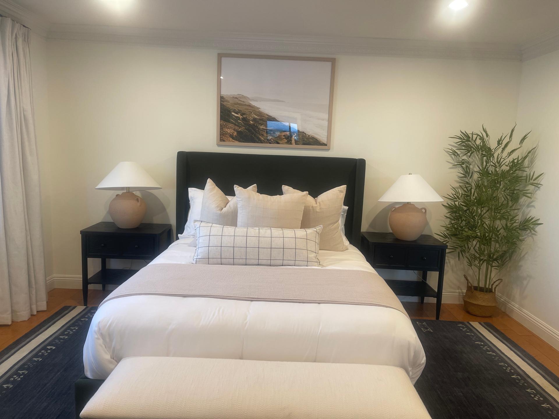 Freshly cleaned and staged bedroom by Garcia's Maids of North County