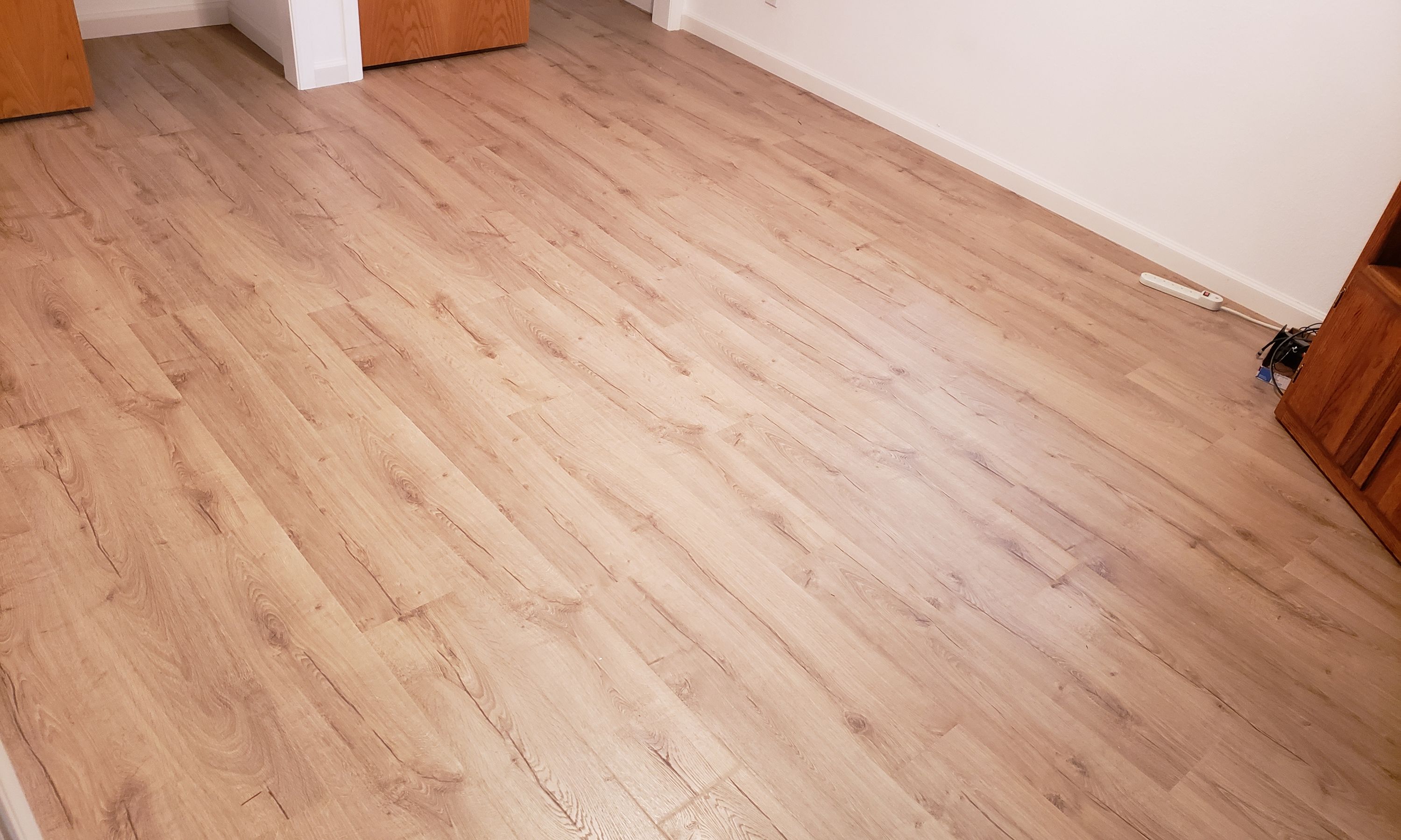 Laminate Flooring Installation by Heavenly Floors, Inc.