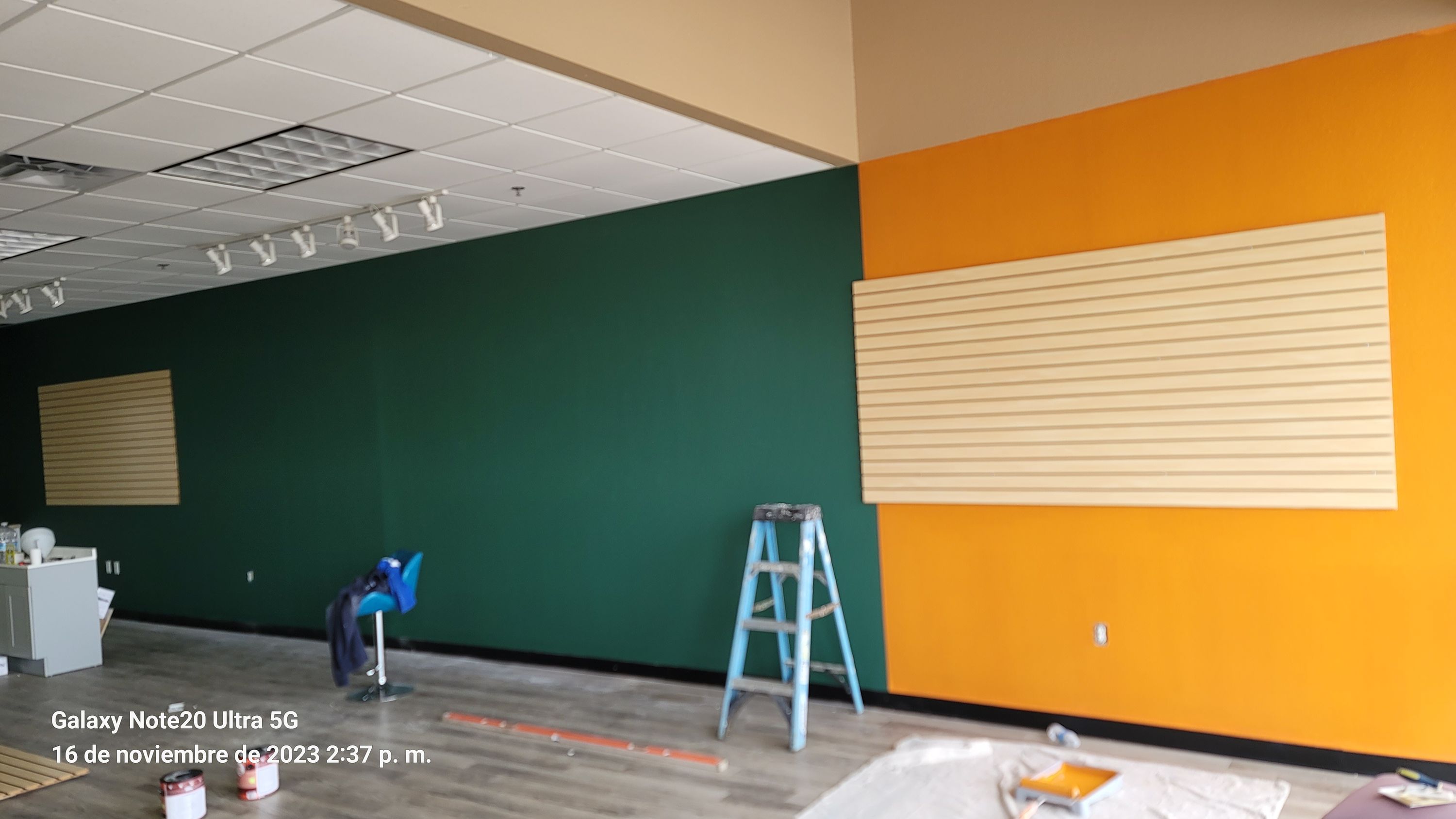 Interior with freshly painted green and orange walls