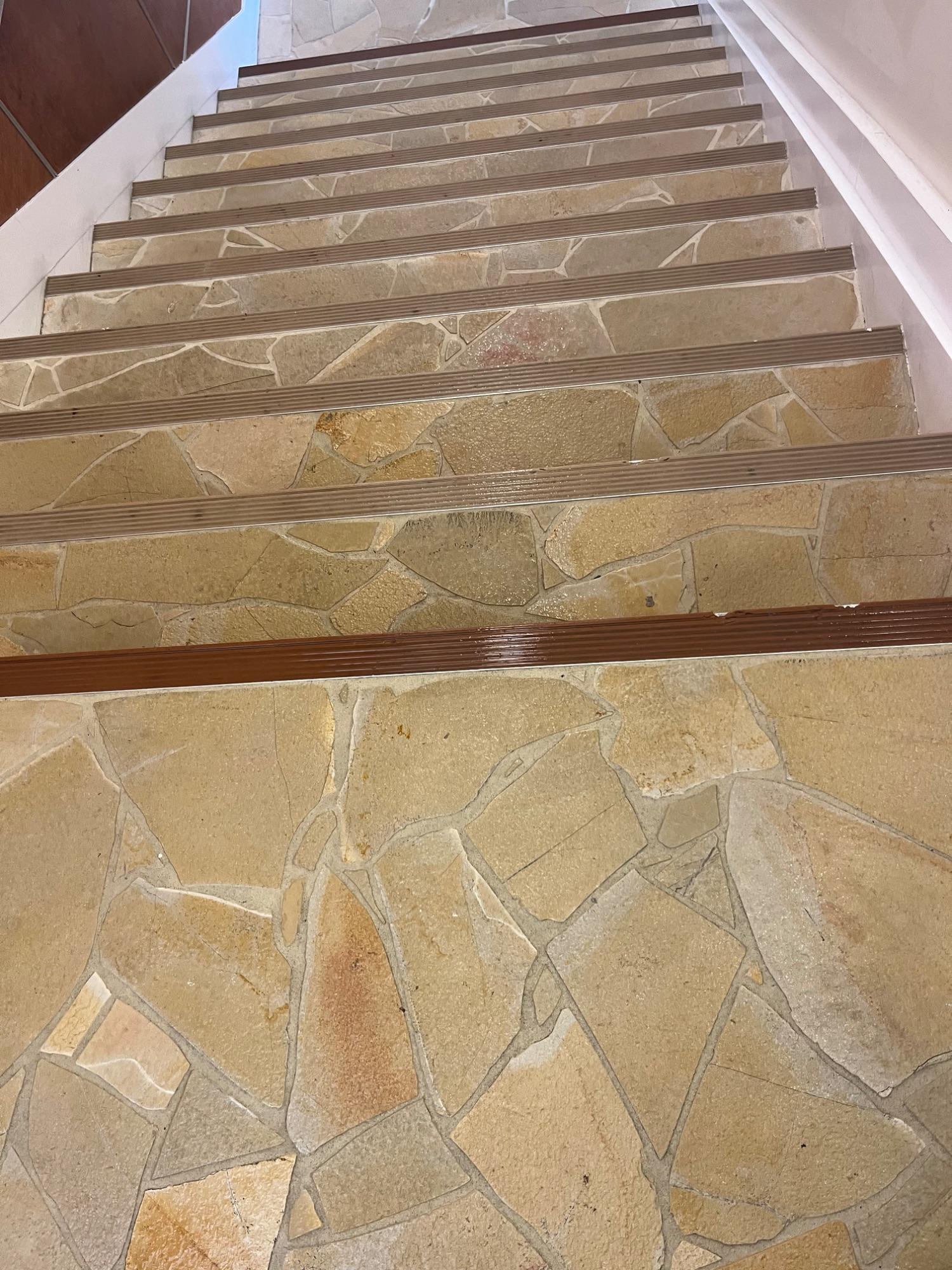 Flagstone lobby floor and stairs freshly scrubbed and sealed by ICC Property Cleaning
