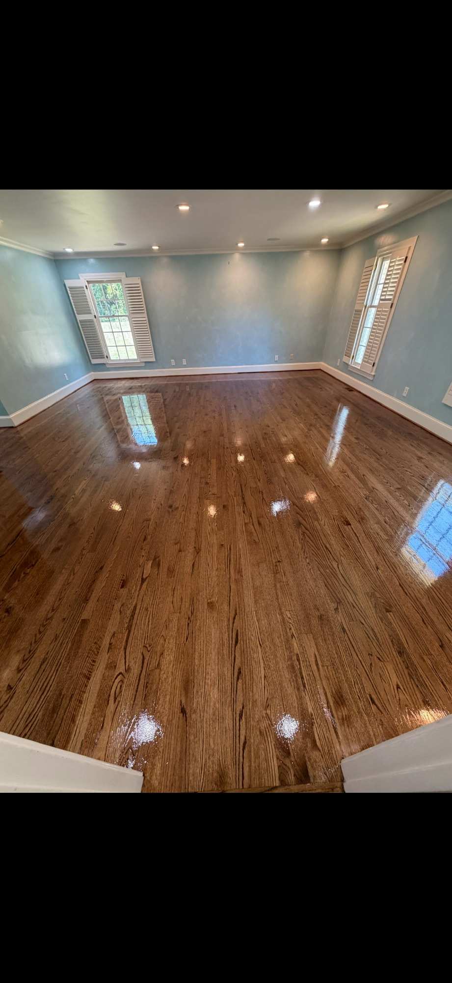 Refinished hardwood floor completed by JG Flooring Solutions LLC in Charlotte, North Carolina