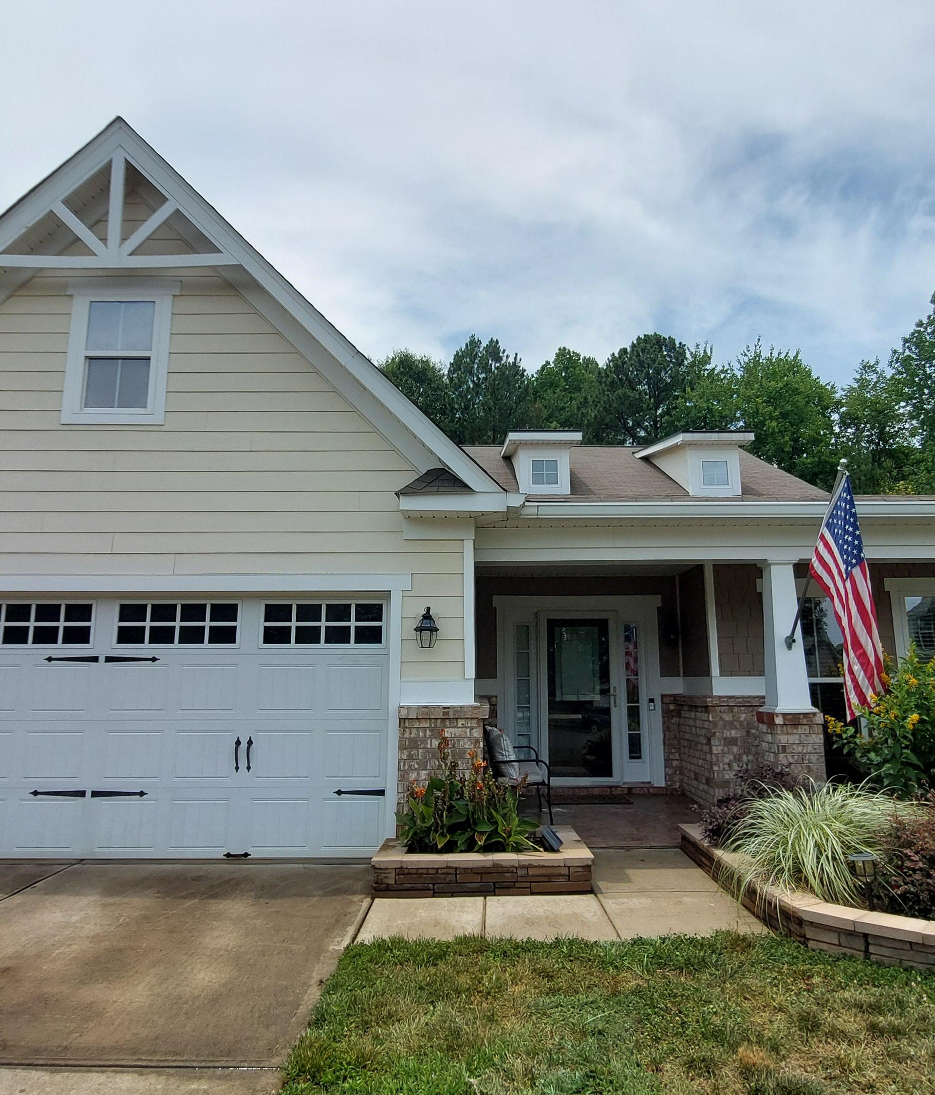 Freshly washed home with clean siding and driveway in Philadelphia, PA