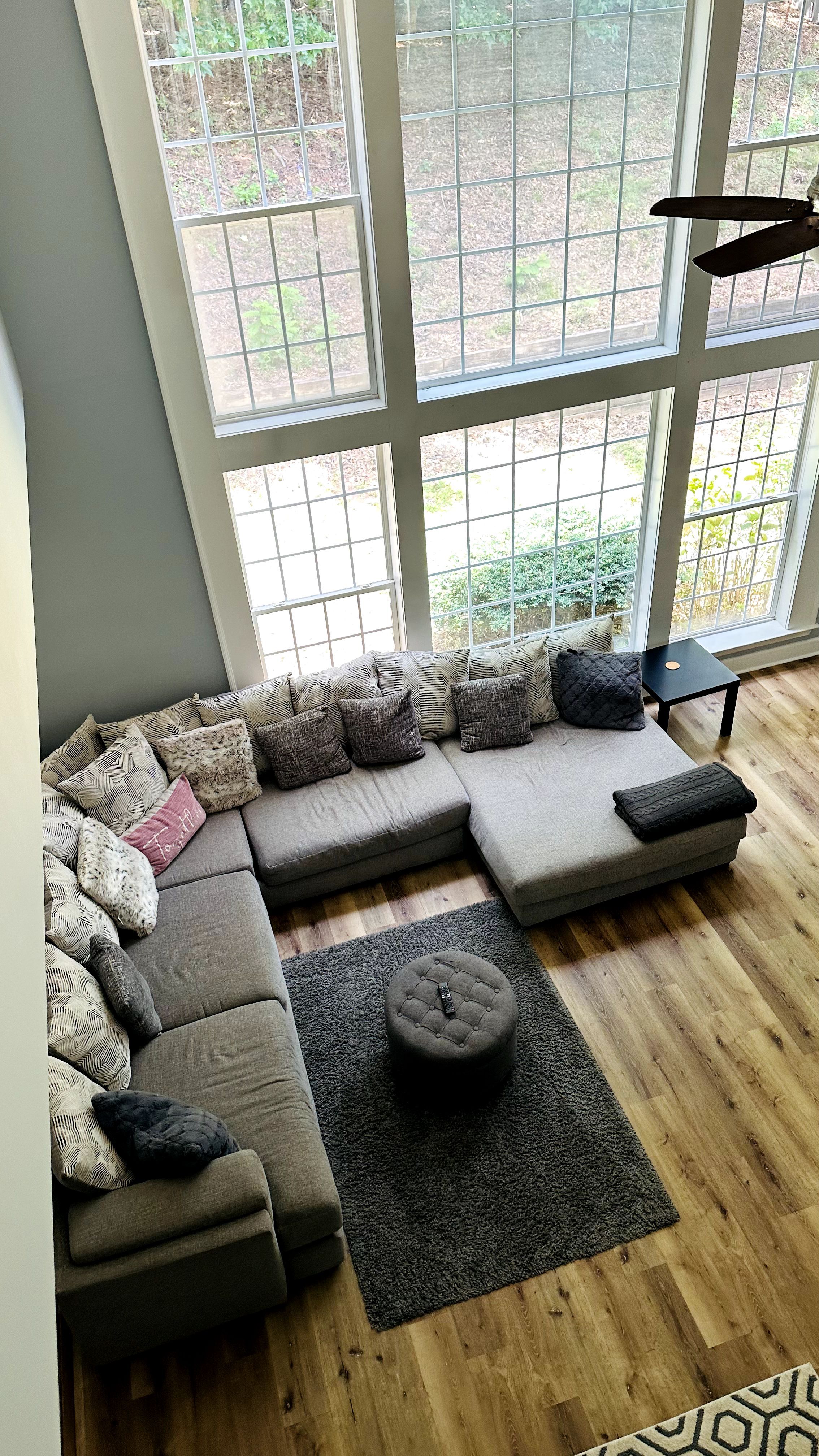 Two-story living room cleaned by Legacy Professional Cleaning