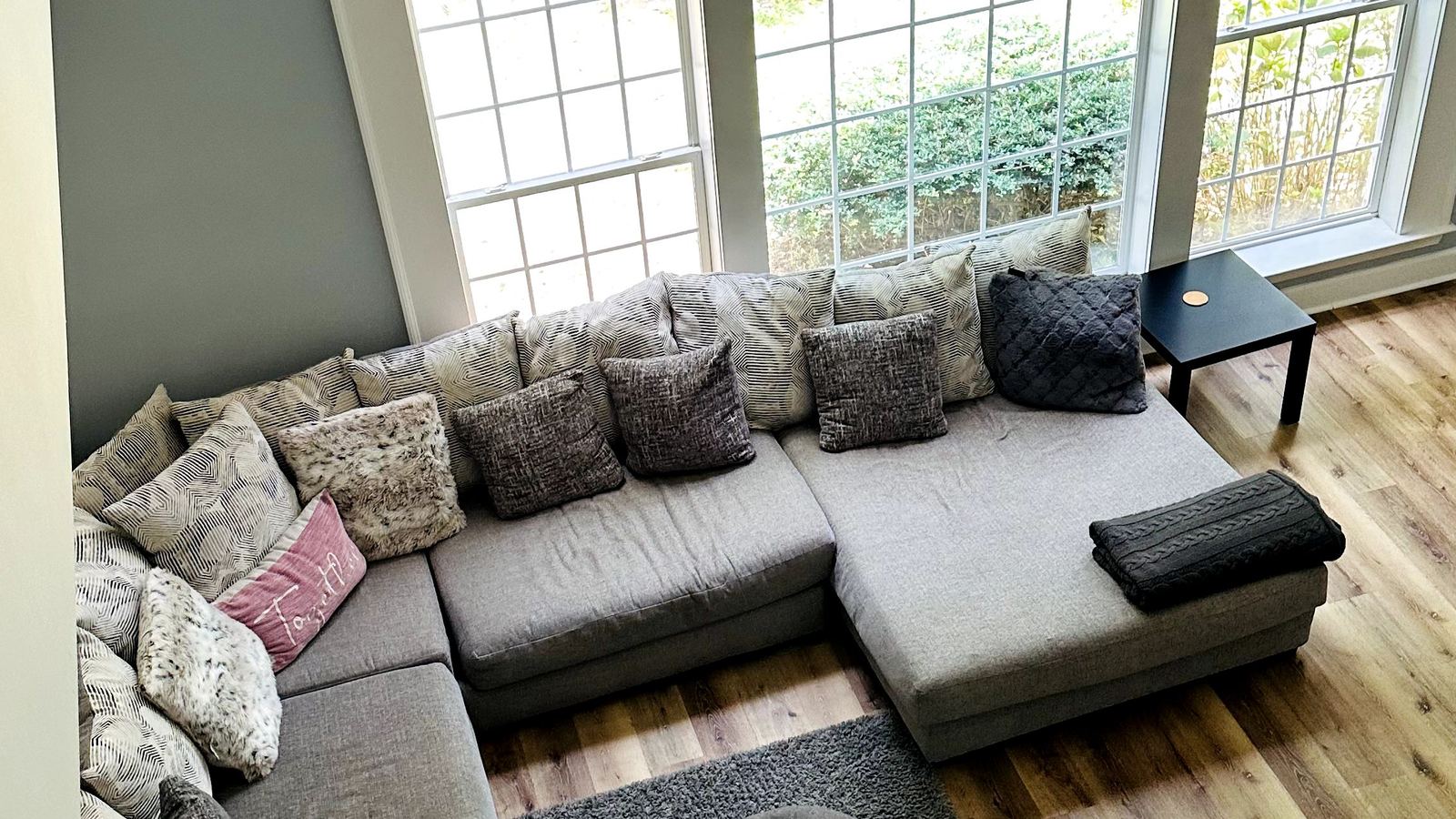Two-story living room cleaned by Legacy Professional Cleaning