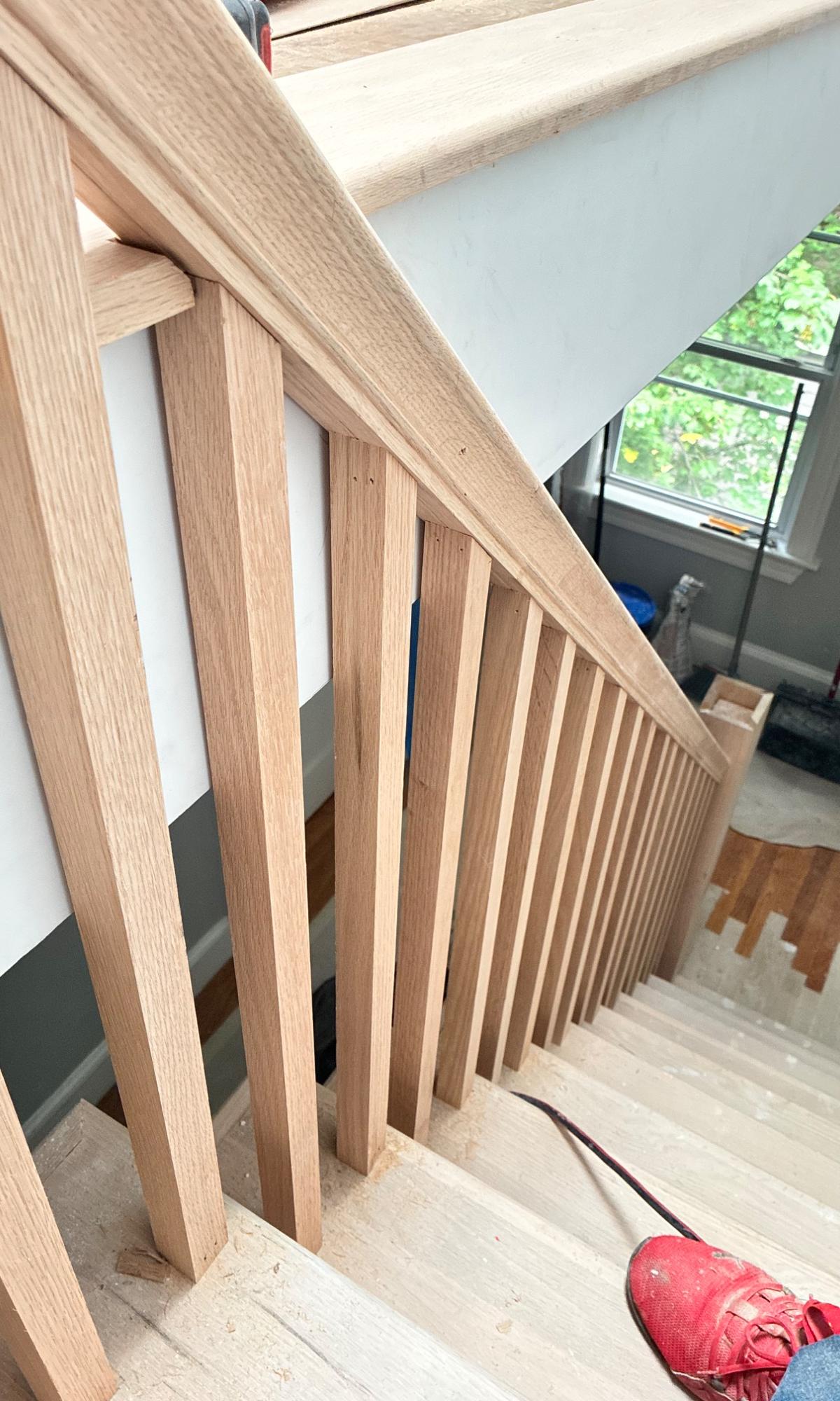 Red oak stair railing with square balusters