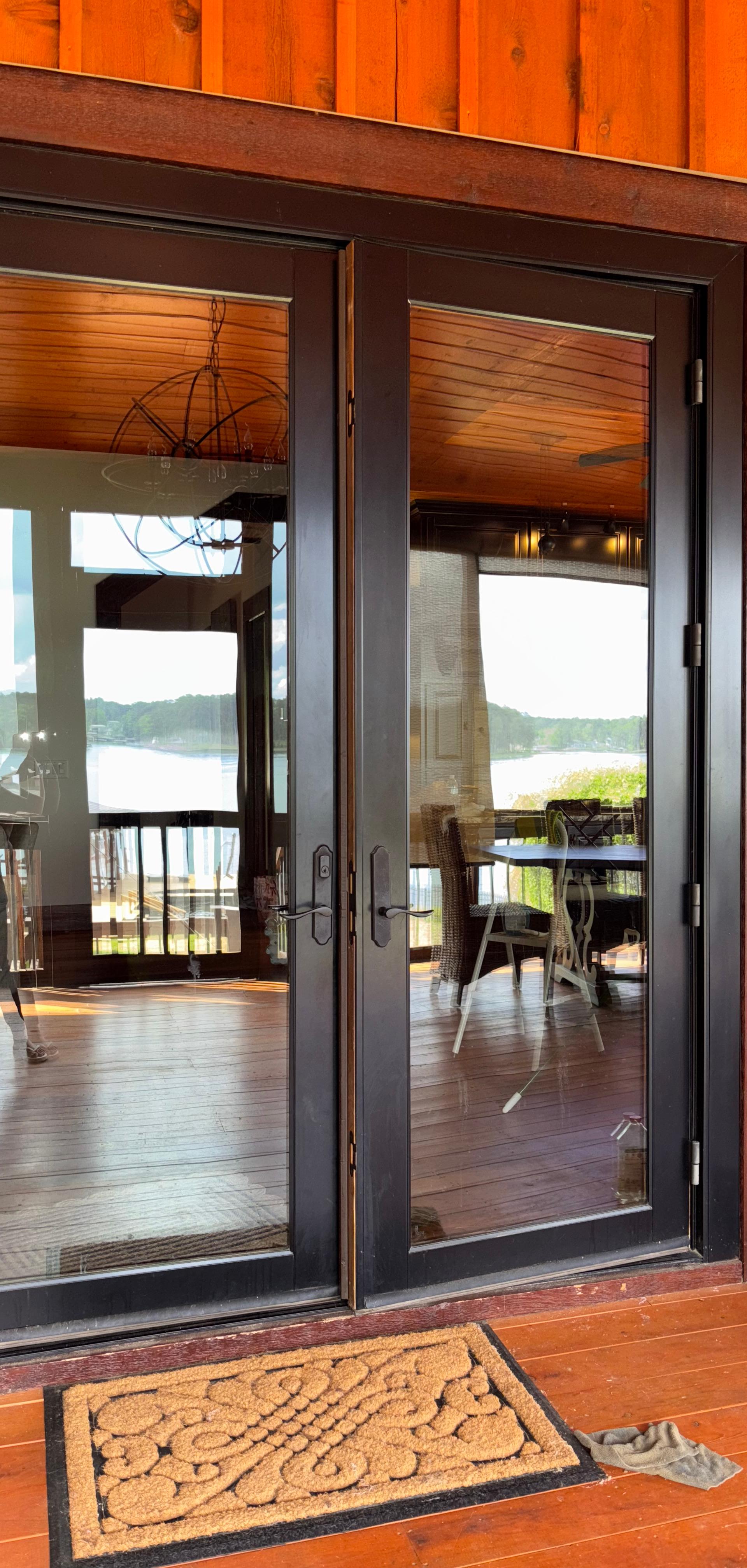 Lake house dining room cleaned and set by Mary's Black Label Cleaning Co.