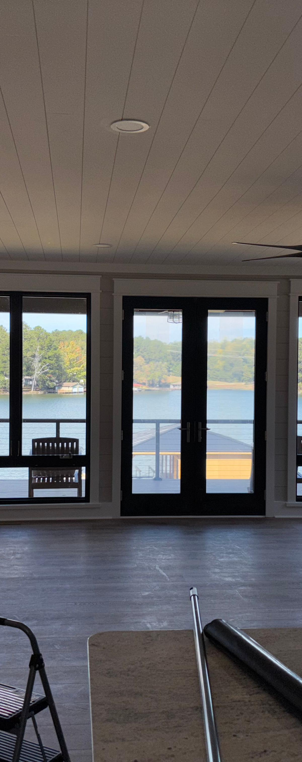 Mary's Black Label crew cleaning a Lake Country home with lake views
