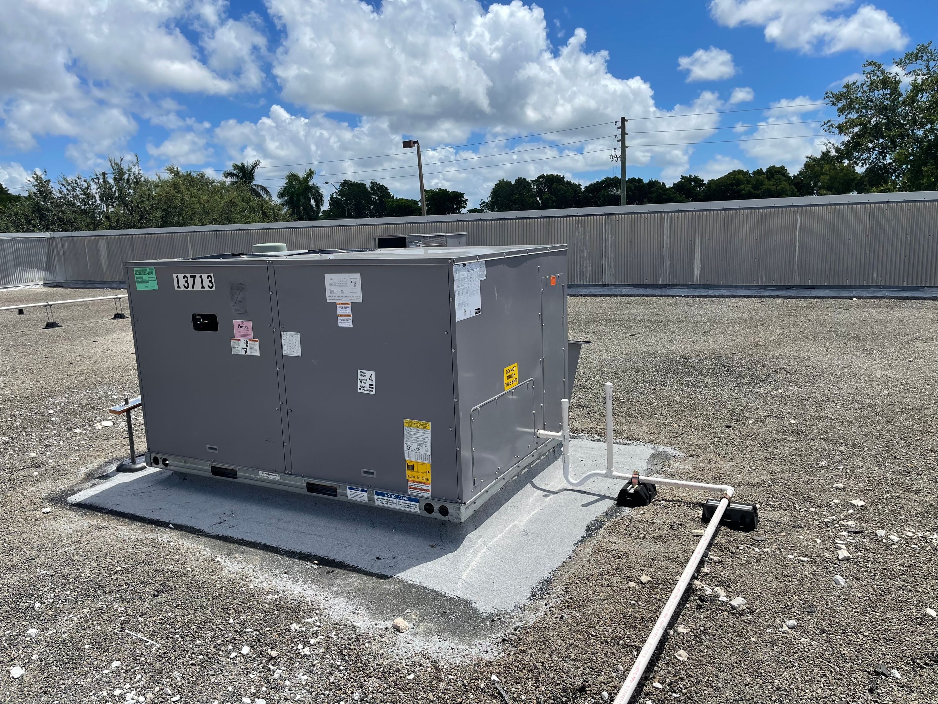 Master Mechanical HVAC Corp technicians on a Miami job site