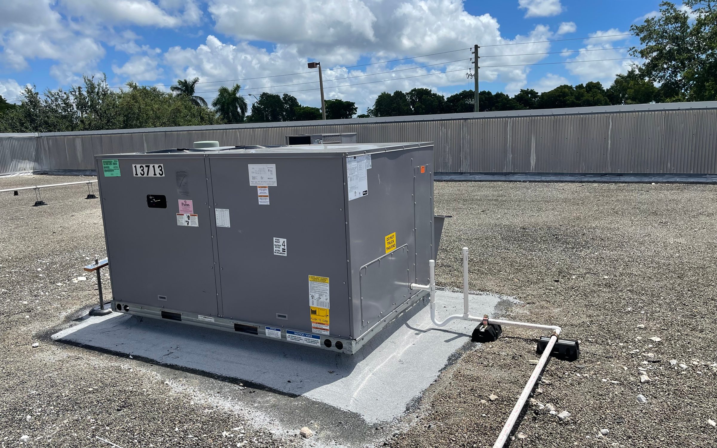 Master Mechanical HVAC Corp technicians on a Miami job site