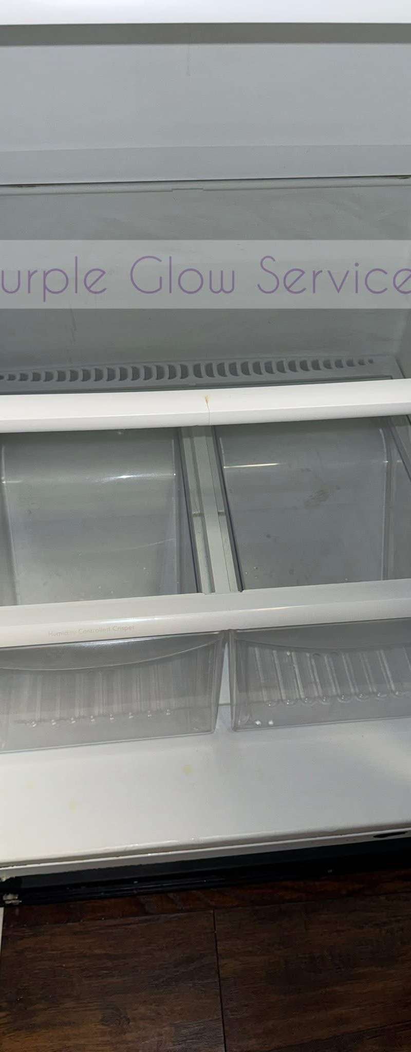 Empty refrigerator interior washed down with clean glass shelves during a move-out cleaning in Murfreesboro, TN
