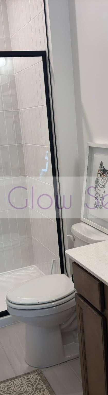 Clean bathroom with streak-free shower glass, mirror and vanity after a house cleaning in Smyrna, TN