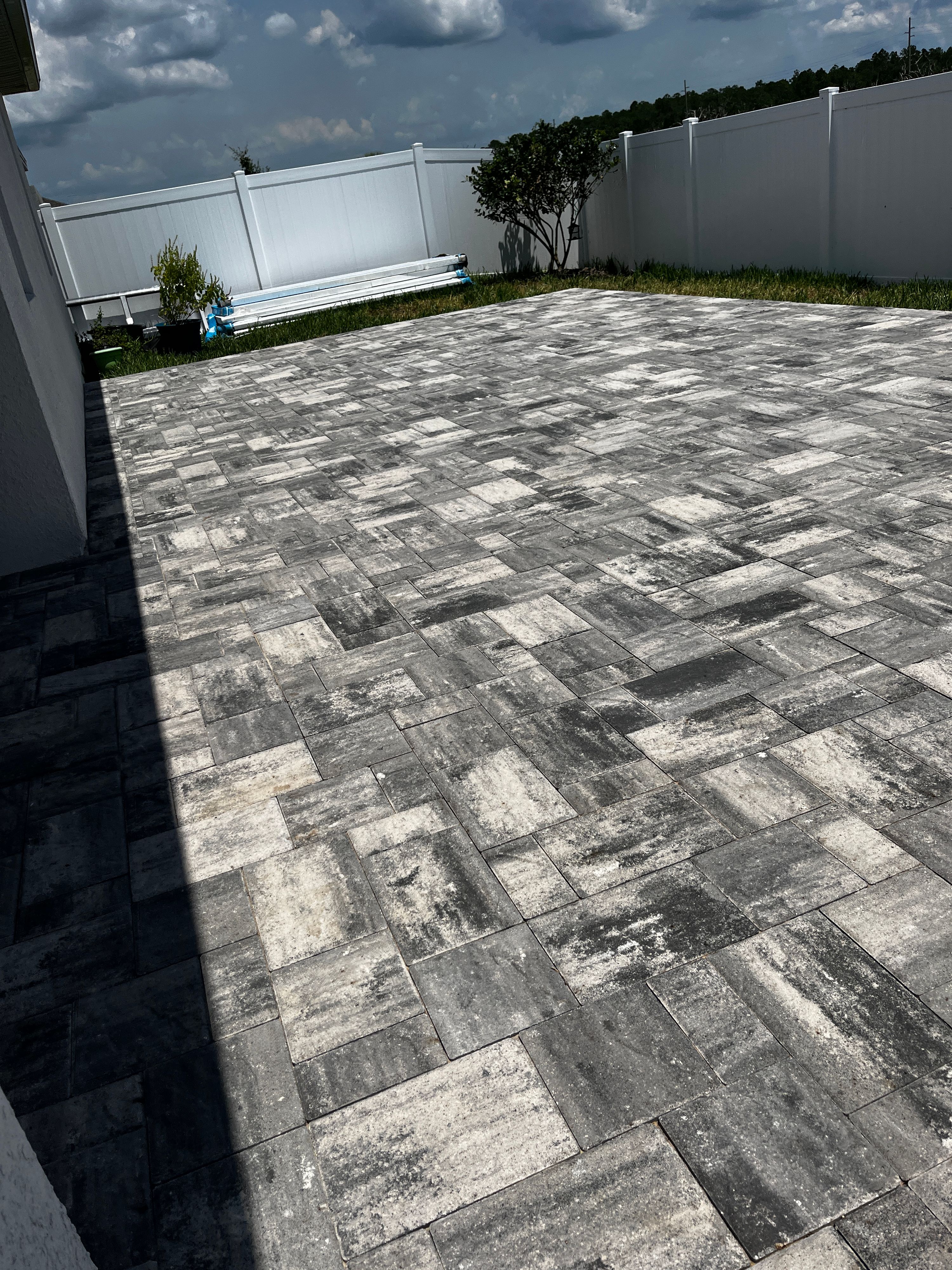REO Professional Services crew building a covered patio in Central Florida