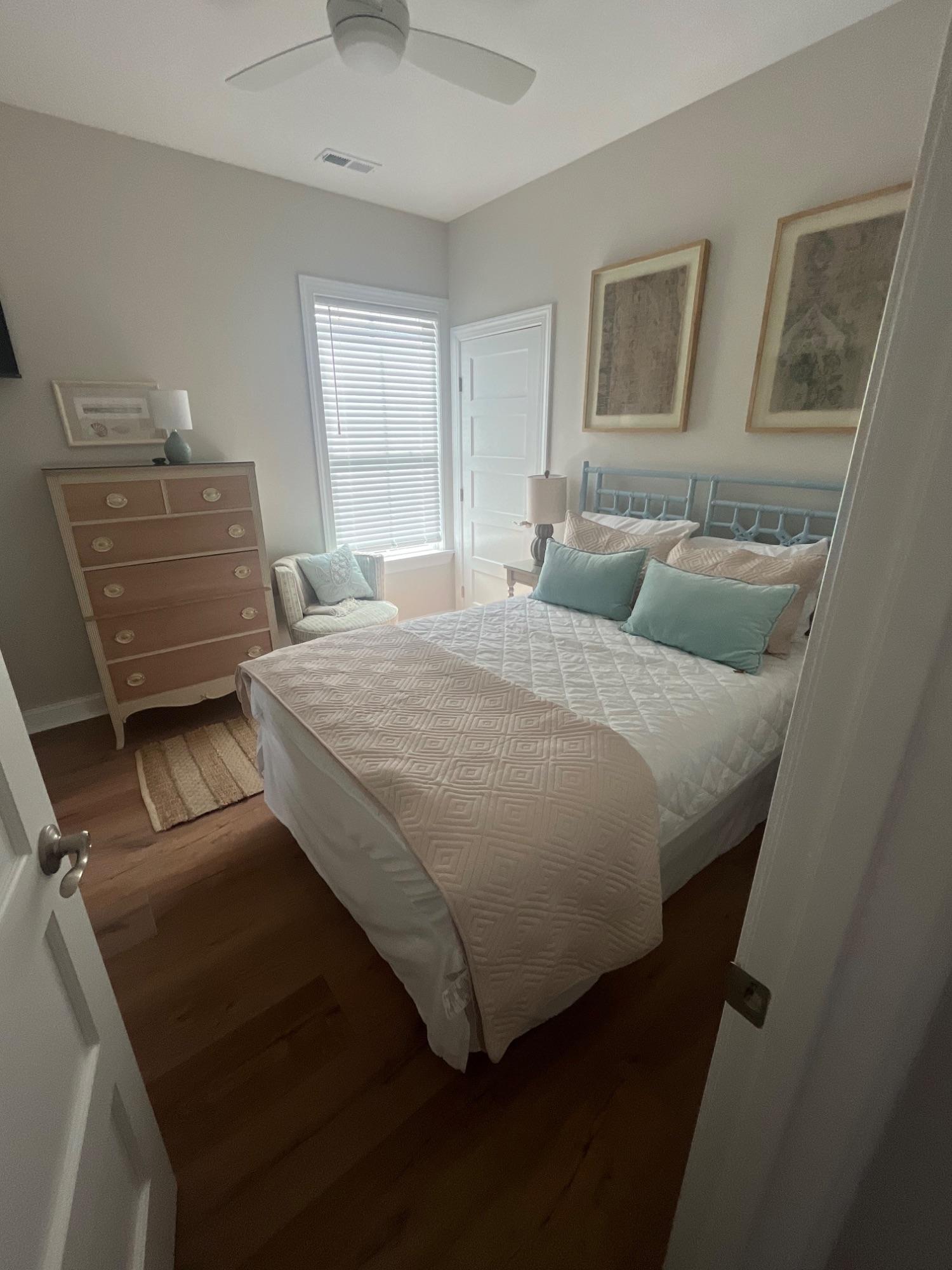 Freshly cleaned coastal guest bedroom in a Crystal Coast vacation rental