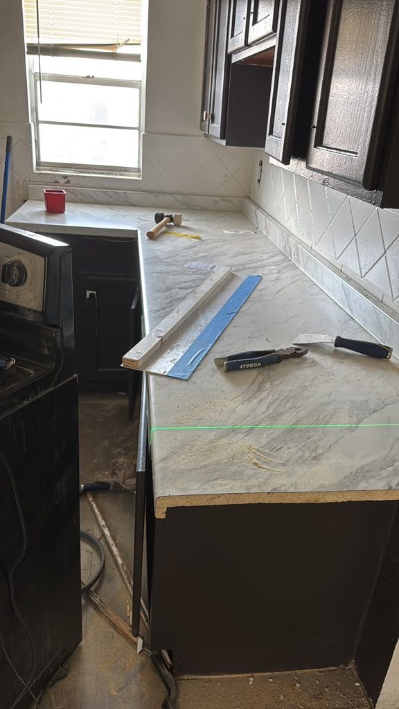Cabinet and counter installation — Kitchen Refresh project by SoHo Home Multiservices