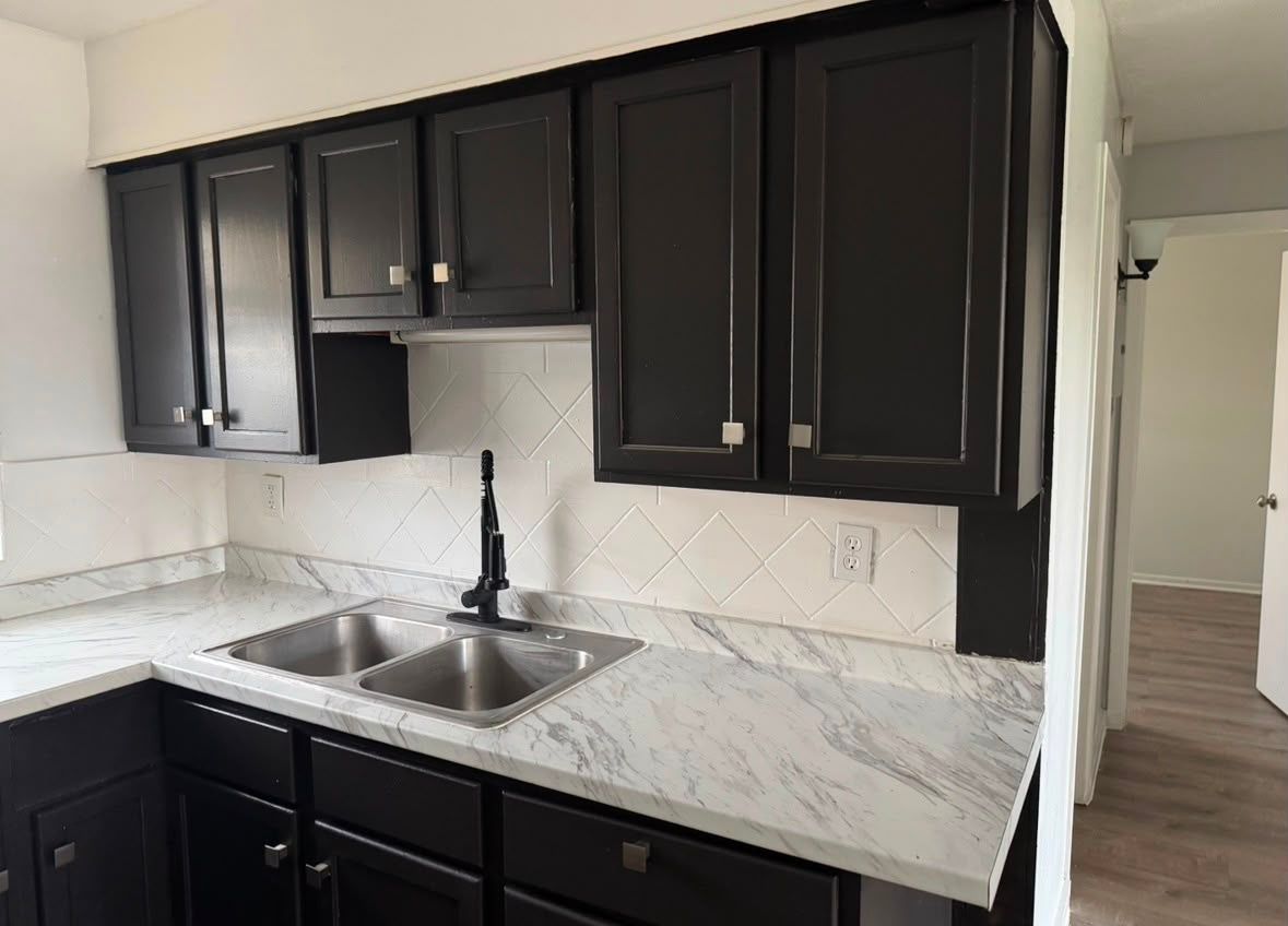 Refinished cabinets and new counters — completed kitchen refresh project by SoHo Home Multiservices