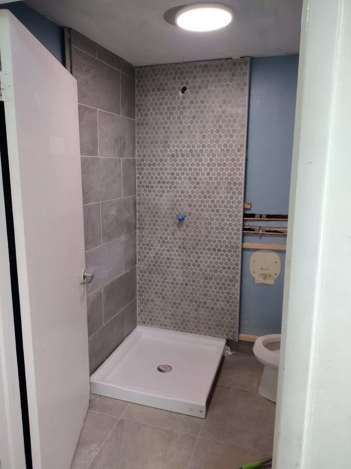 Finished walk-in shower — Bathroom Remodel project by SoHo Home Multiservices