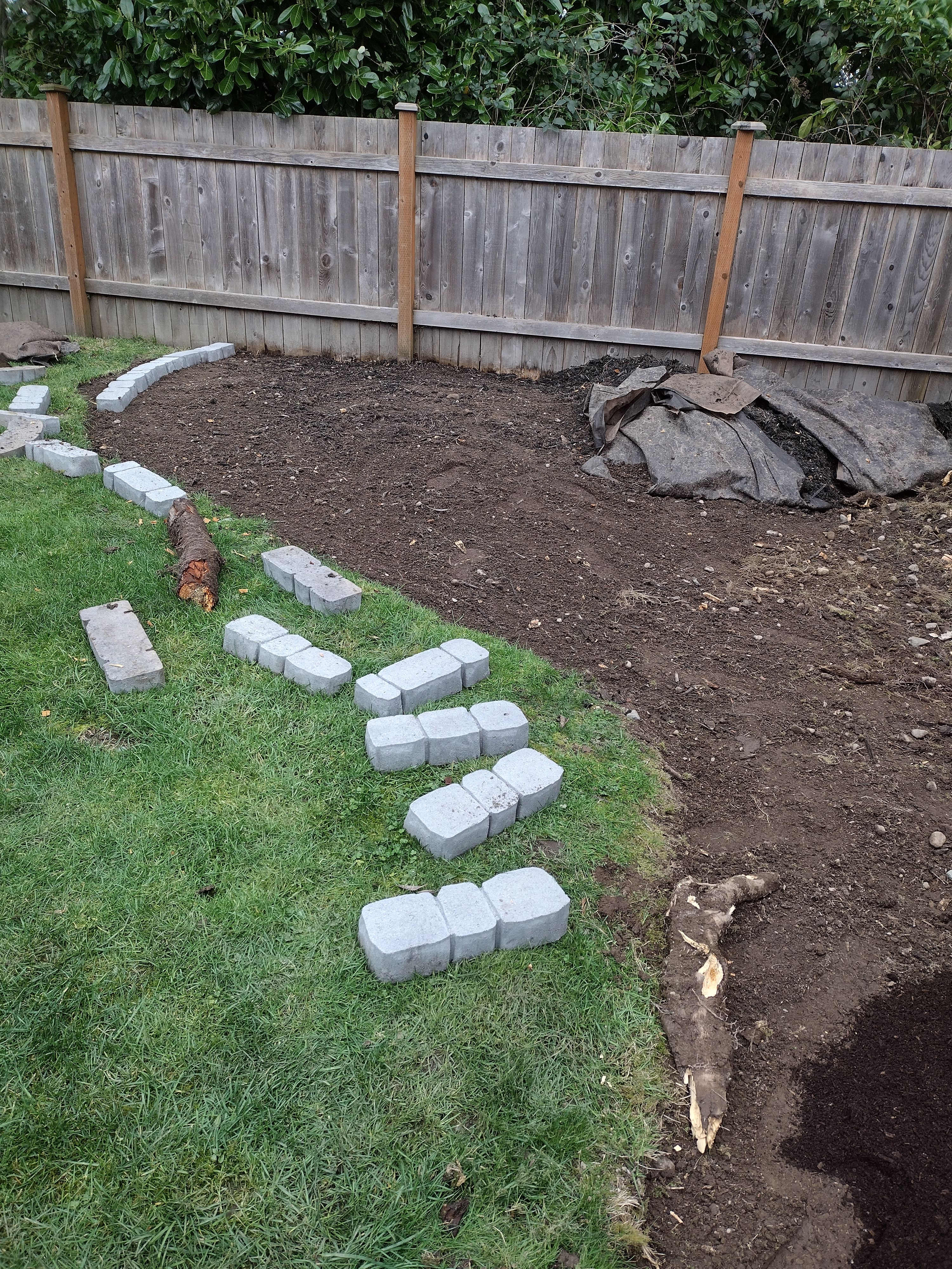 Stone edging set for a new planting bed