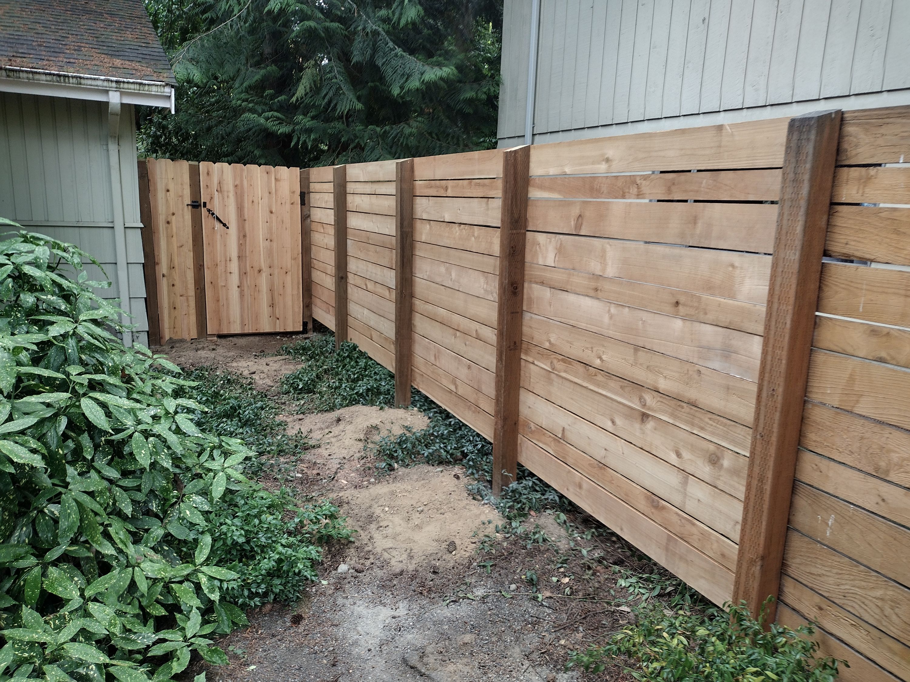 New horizontal cedar fence and matching gate